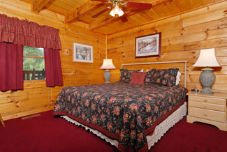 Pigeon Forge Cabin that Features a King Size Bed in the Bedroom